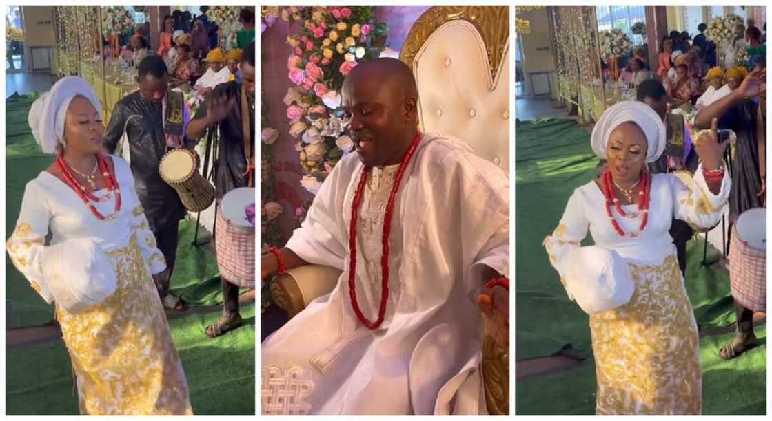 Nigerian room dances while sitting on his chair while bride shows of cool dance steps on stage. Nigerian room dances while sitting on his chair while bride shows of cool dance steps on stage.