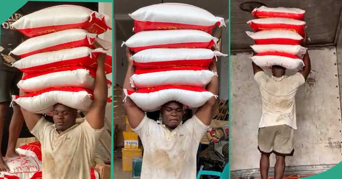 Man carrying five bags of rice on his head. Man carrying five bags of rice on his head.