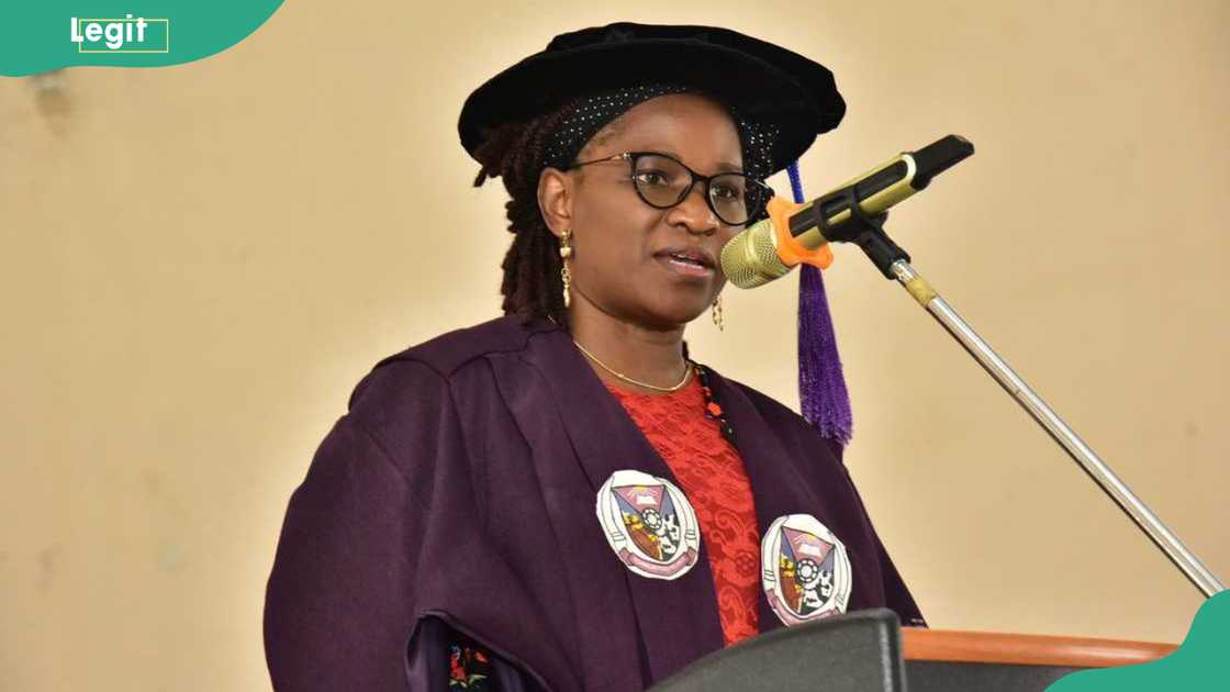 Professor Adenike Oladiji speaking on a podium