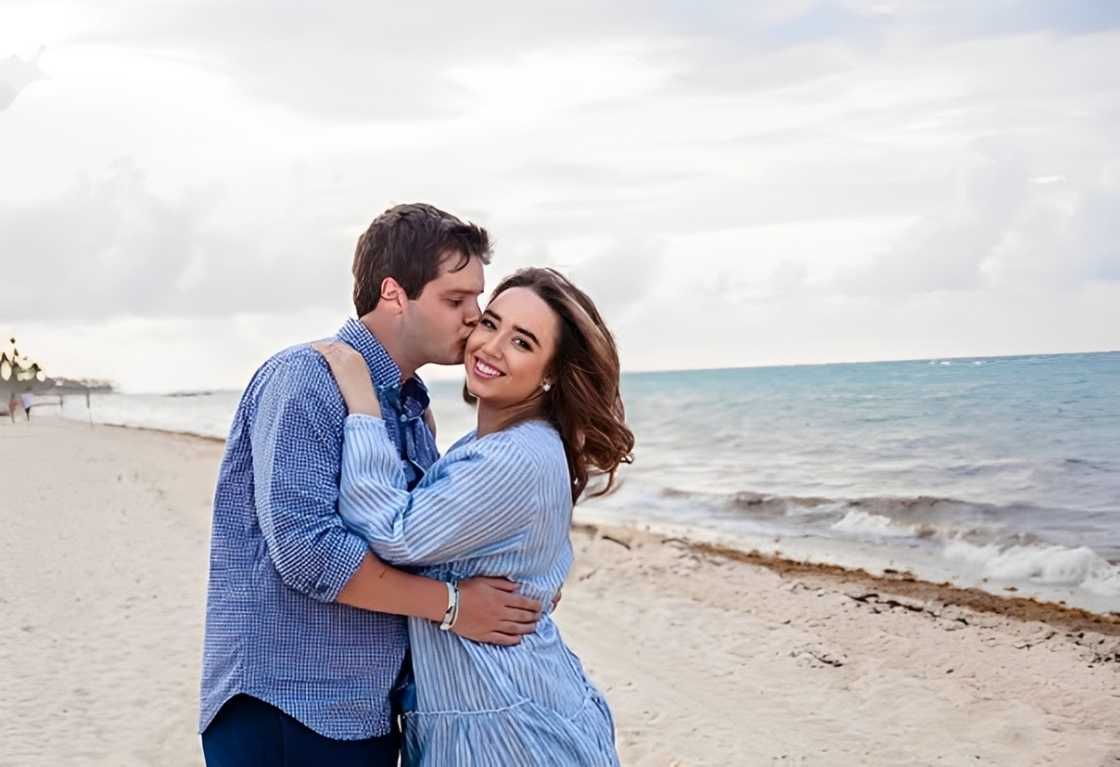 John McKean kisses his wife Samantha Finglass