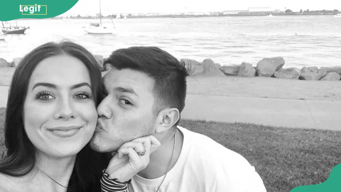 Marie Juliette and Dominik Mysterio are taking a selfie.