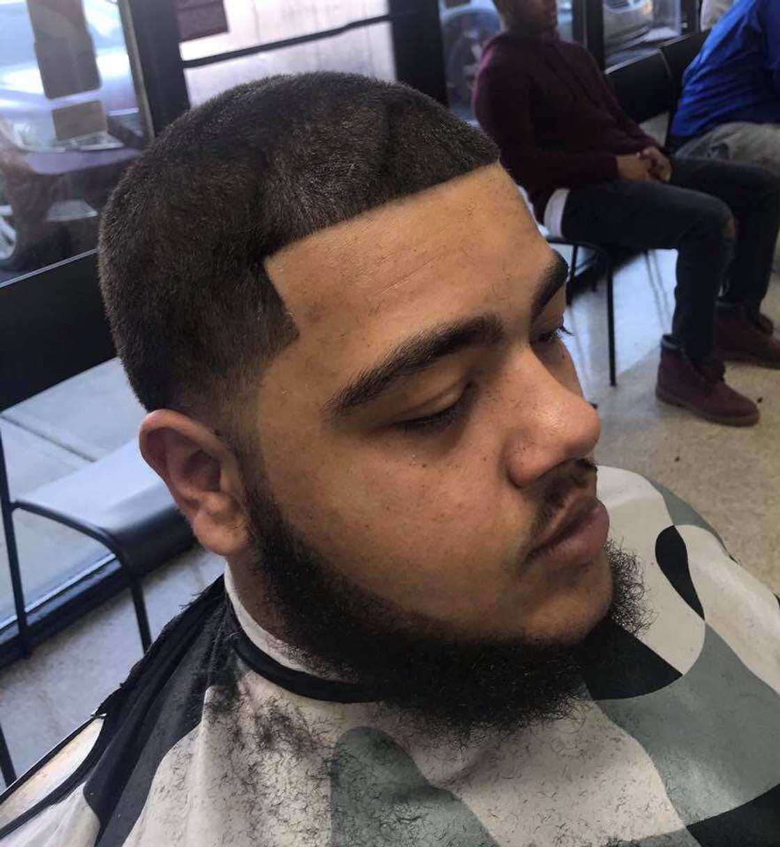 Sharp buzz cut with fade Sharp buzz cut with fade