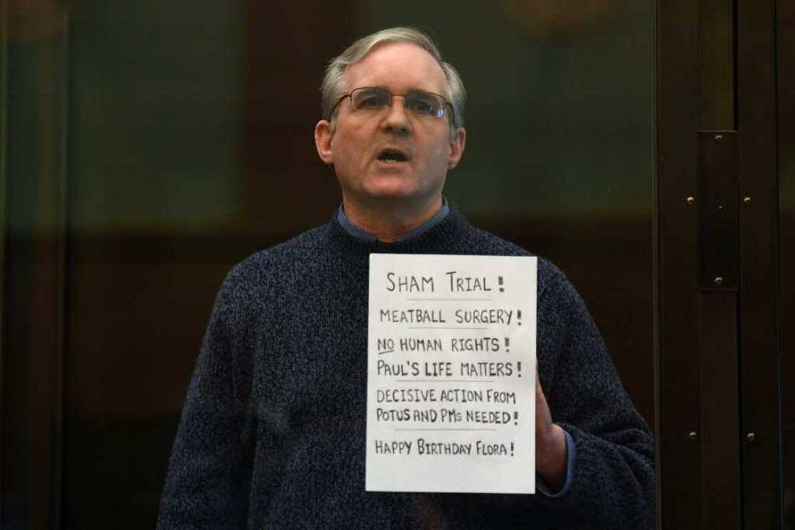In this file photo taken on June 15, 2020 Paul Whelan, a former US marine accused of espionage, stands inside a defendants' cage as he waits to hear his verdict in Moscow In this file photo taken on June 15, 2020 Paul Whelan, a former US marine accused of espionage, stands inside a defendants' cage as he waits to hear his verdict in Moscow