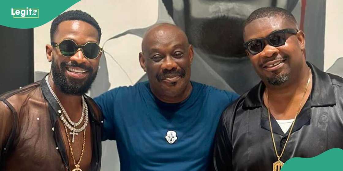 Don Jazzy's father adopts D'banj at his 20th anniversary dinner. Don Jazzy's father adopts D'banj at his 20th anniversary dinner.