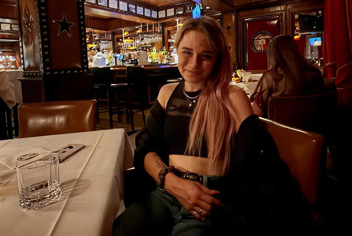 Daria Grinkova poses sitting Daria Grinkova poses sitting