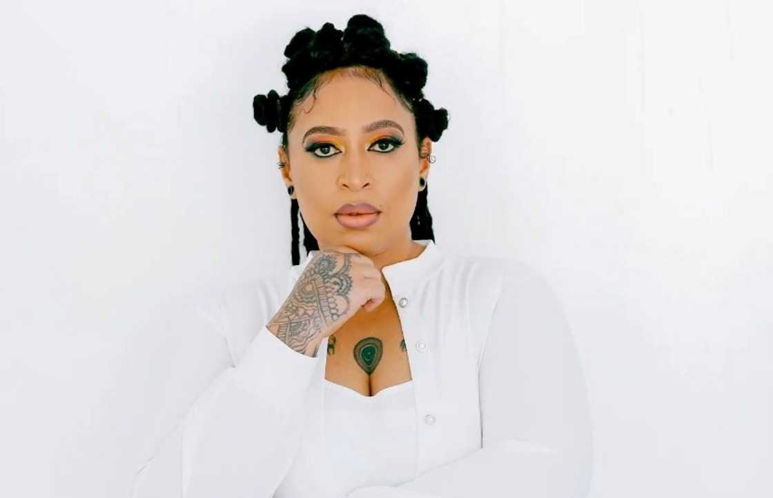 Nazizi poses in a white outfit Nazizi poses in a white outfit