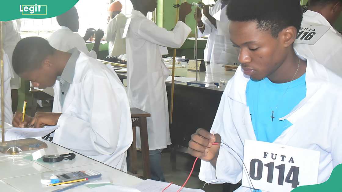 Federal University of Technology, Akure students taking part in a practical session in a lab