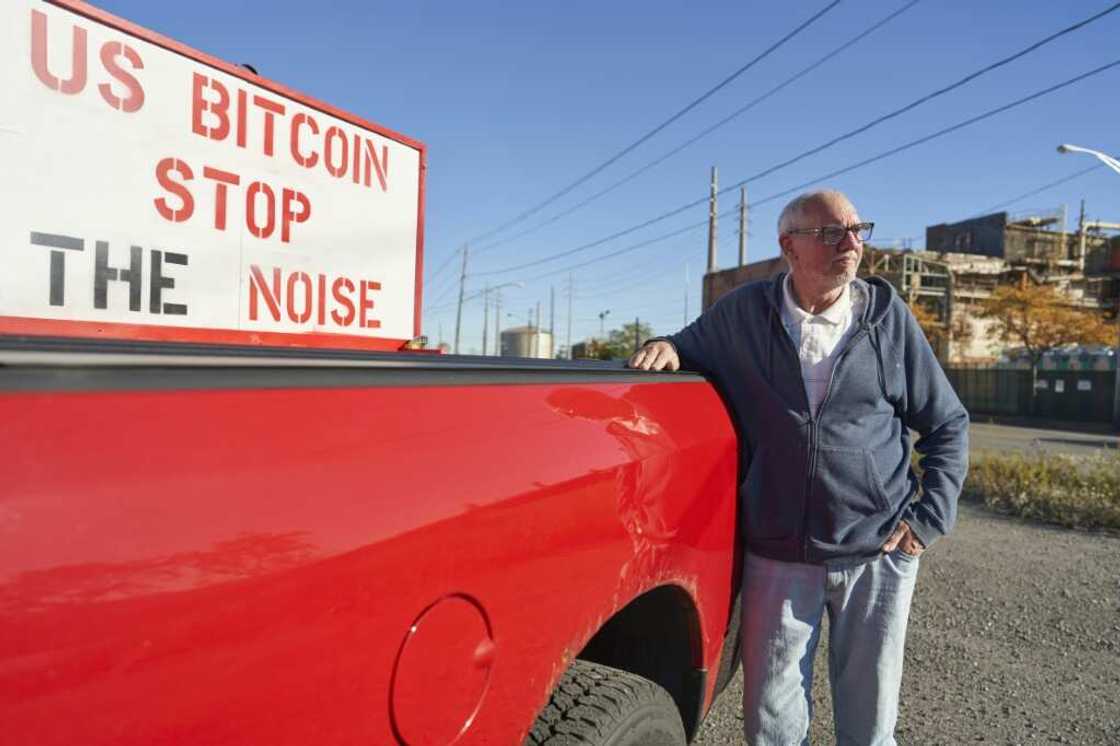 Bryan Maacks put up a sign protesting US Bitcoin over the noise of its operations in Niagara Falls, New York Bryan Maacks put up a sign protesting US Bitcoin over the noise of its operations in Niagara Falls, New York