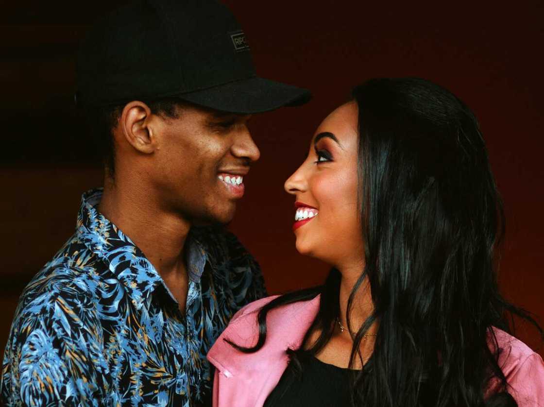 A couple starring at each other in the eyes. A couple starring at each other in the eyes.