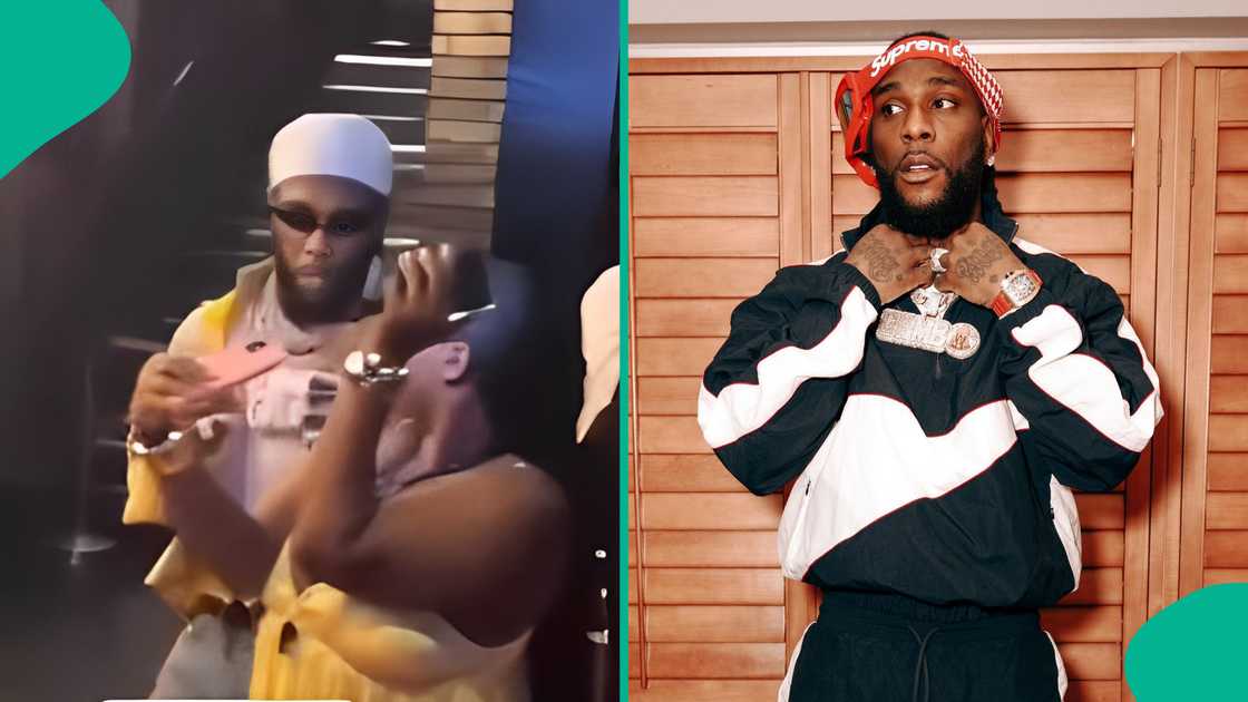 Burna Boy takes picture with female fan excitedly Burna Boy takes picture with female fan excitedly