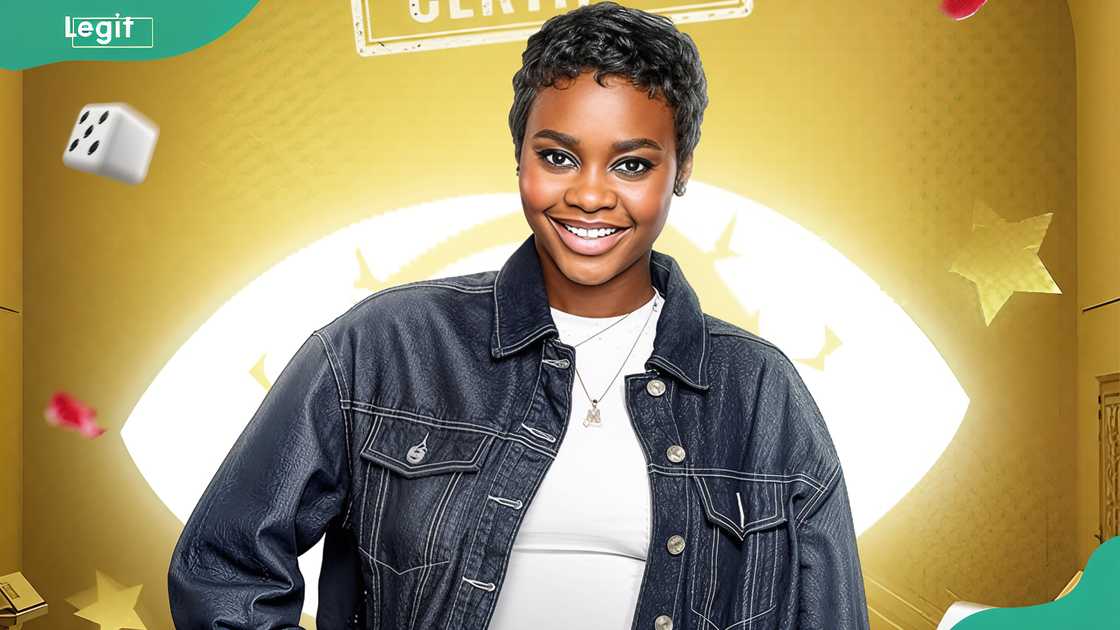 Precious Ashiogwu in a classic dark denim jacket over a white top Precious Ashiogwu in a classic dark denim jacket over a white top