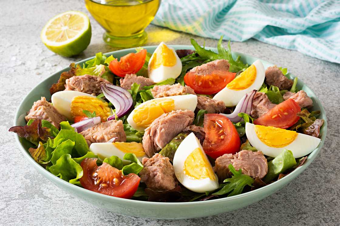 Tuna salad with eggs, tomato and onions