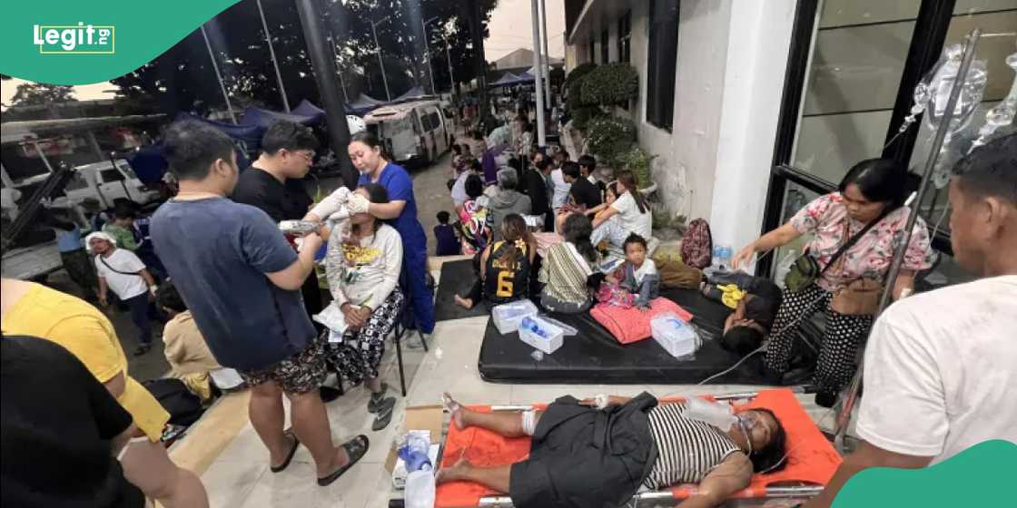 Rescue workers and volunteers search through collapsed structures in Cebu province. Rescue workers and volunteers search through collapsed structures in Cebu province.