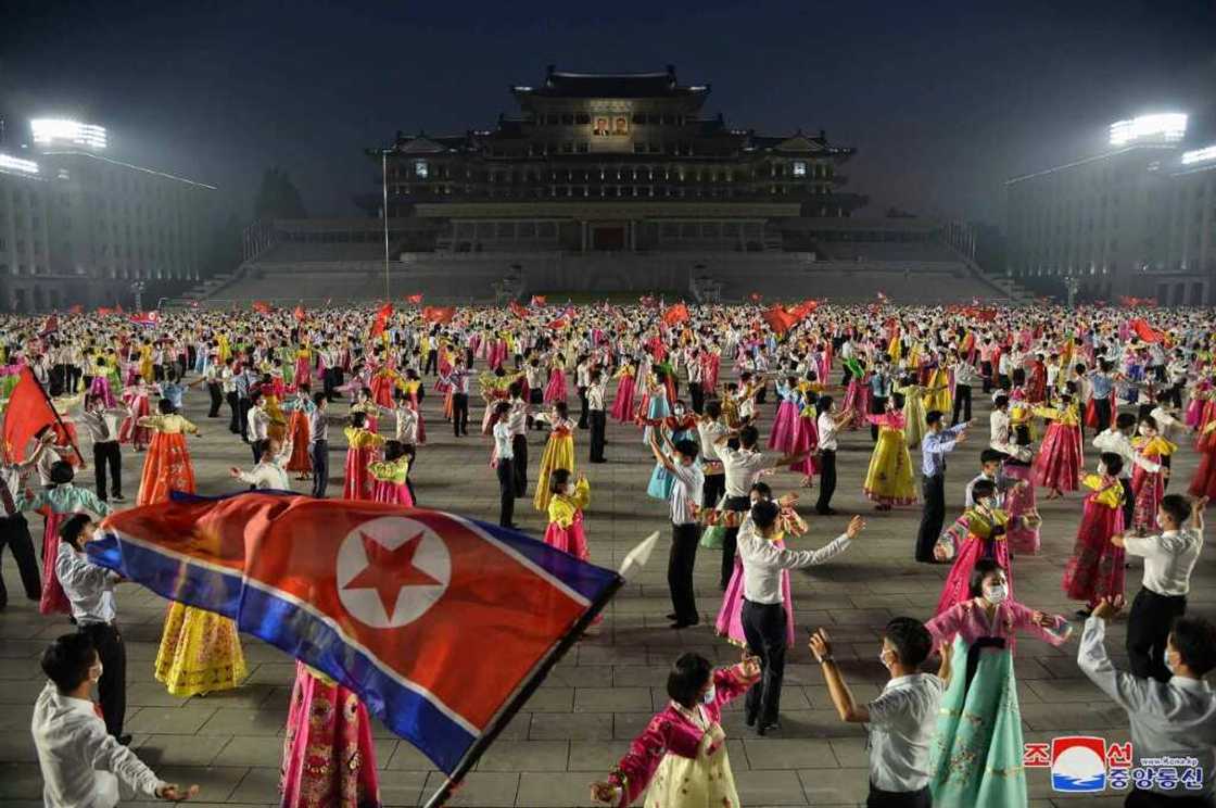 Young students celebrate the 69th anniversary of the Korean War at a night party in Pyongyang Young students celebrate the 69th anniversary of the Korean War at a night party in Pyongyang