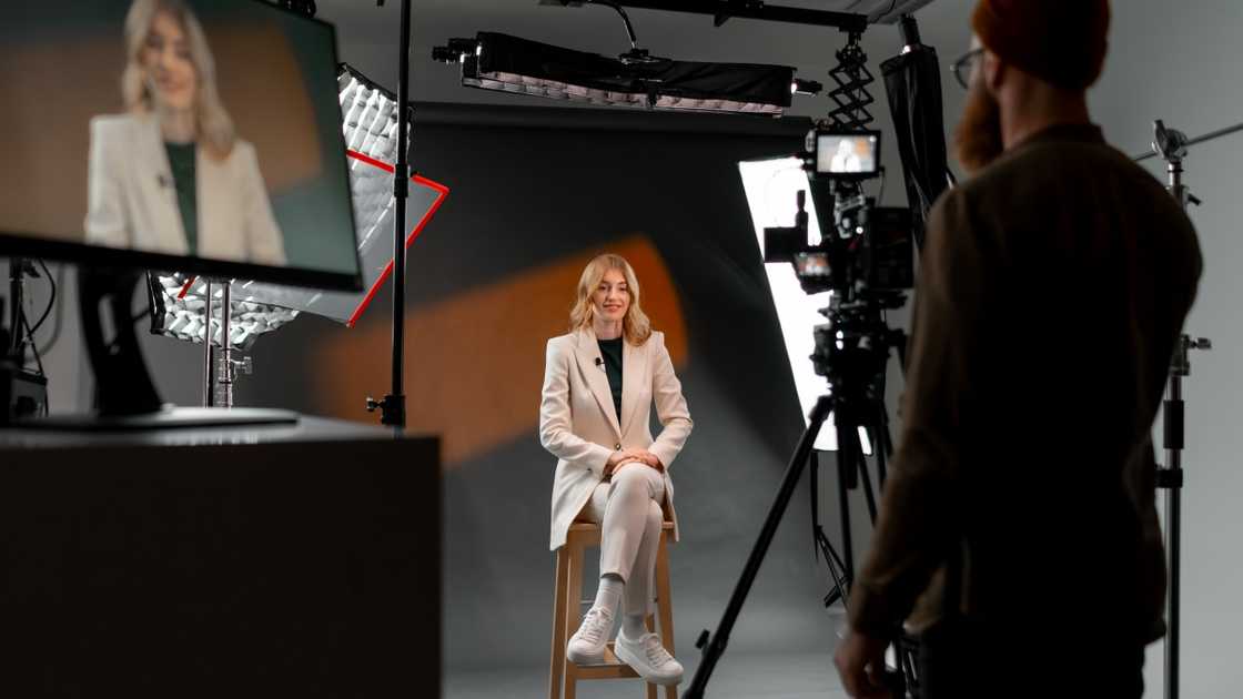 A behind the scenes shot setting the stage for a television show. A behind the scenes shot setting the stage for a television show.