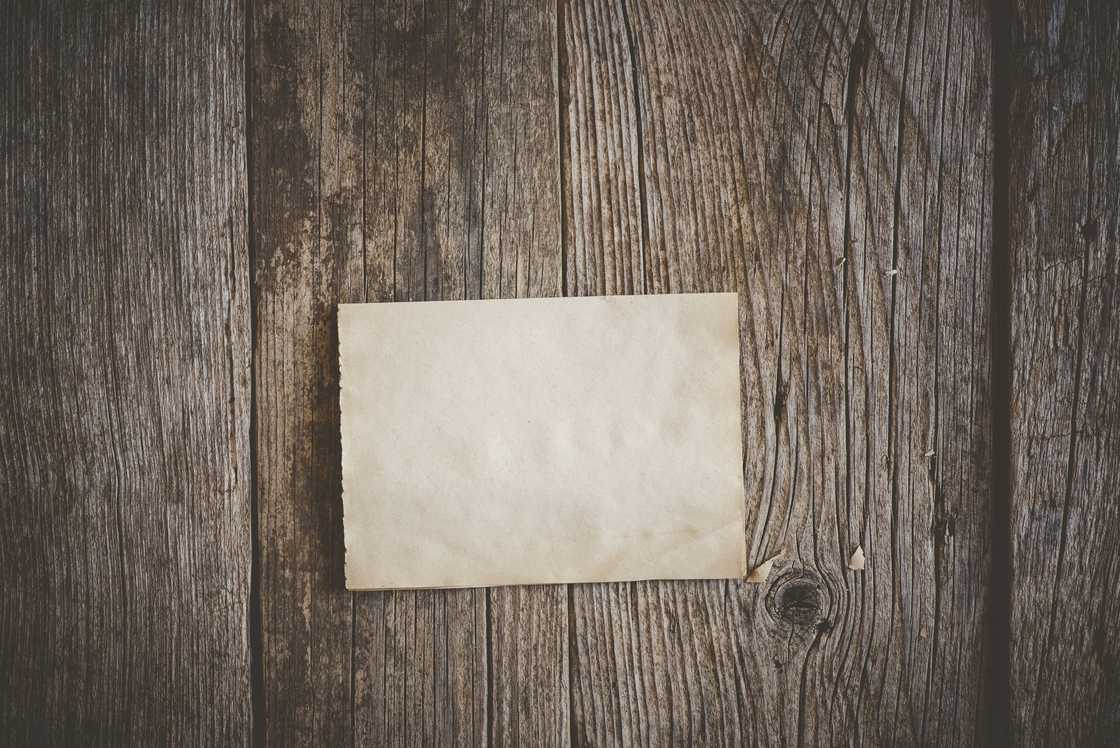 A letter on a wooden surface