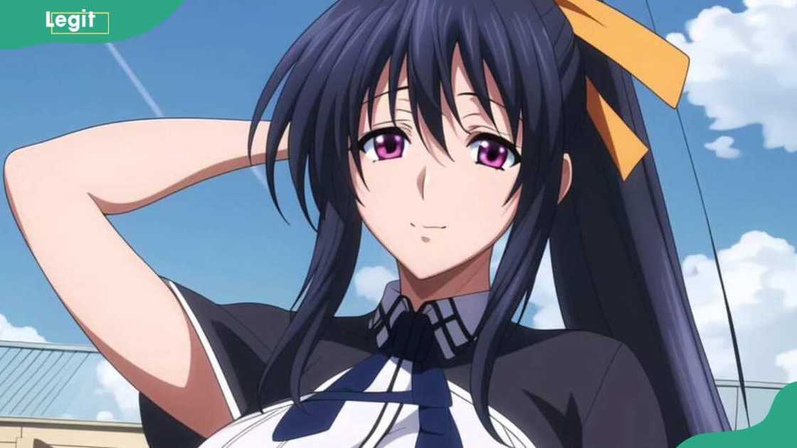 Akeno Himejima posing while holding her back head