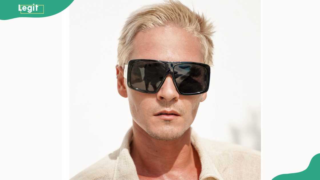 A man in aviator glasses A man in aviator glasses