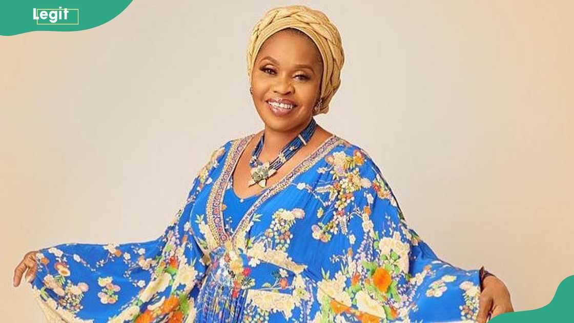 Bola Shagaya in front of a cream background