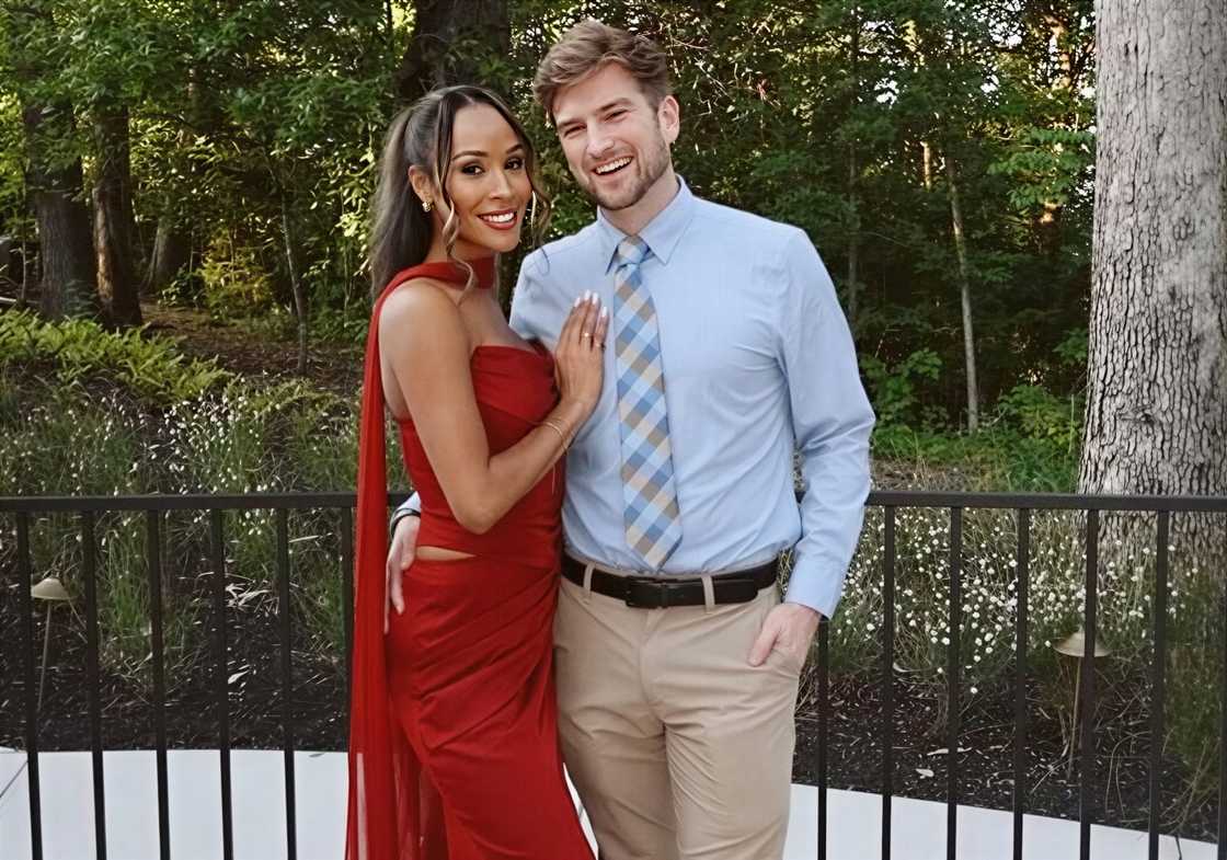 Taylor and Bergie hold each other in a pose.