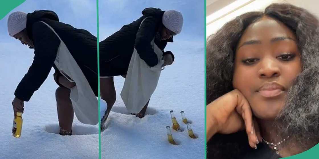 Lady puts her drinks in snow. Lady puts her drinks in snow.