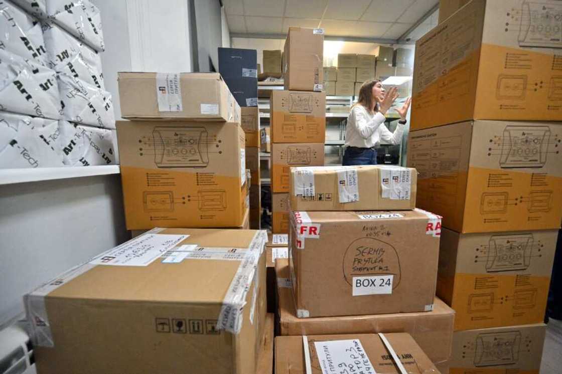 At a warehouse at his foundation's Kyiv headquarters, dozens of volunteers packed and labelled cardboard boxes with everything from rifle scopes and satellite phones to combat medicine destined for soldiers on the warfront At a warehouse at his foundation's Kyiv headquarters, dozens of volunteers packed and labelled cardboard boxes with everything from rifle scopes and satellite phones to combat medicine destined for soldiers on the warfront