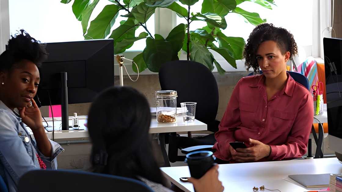 A female designer using a smartphone