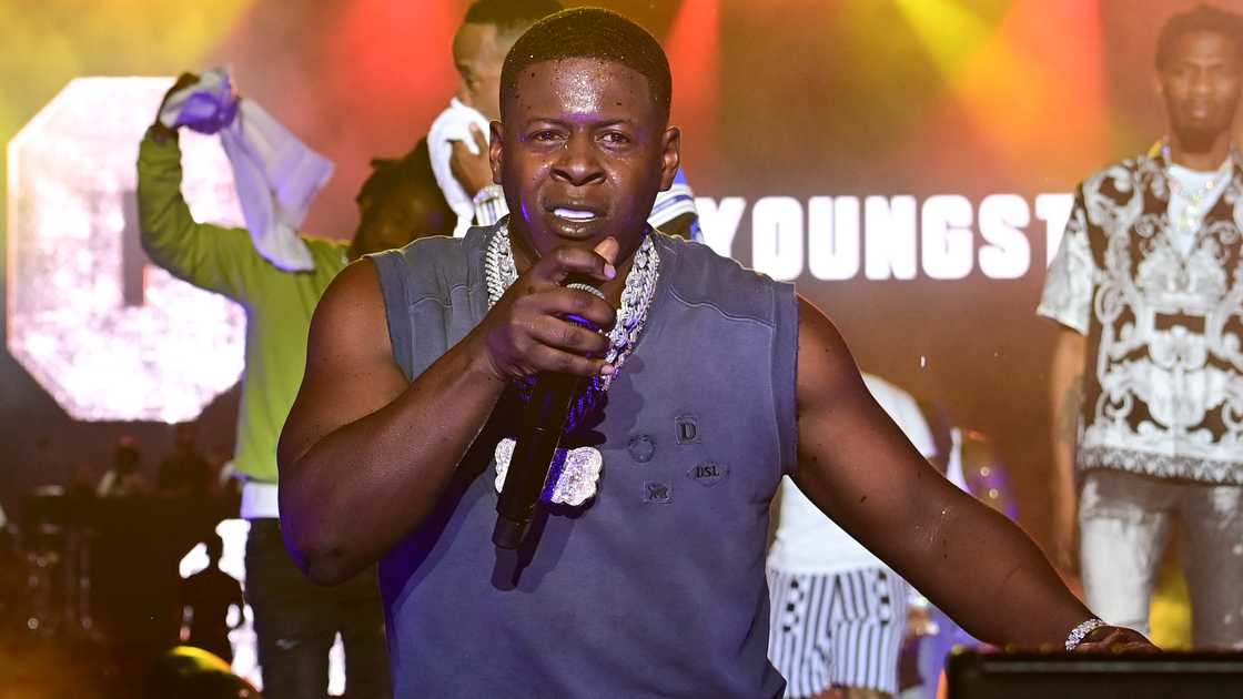 Blac Youngsta holds the microphone as he performs at Hot 107.9 Birthday Bash 2022