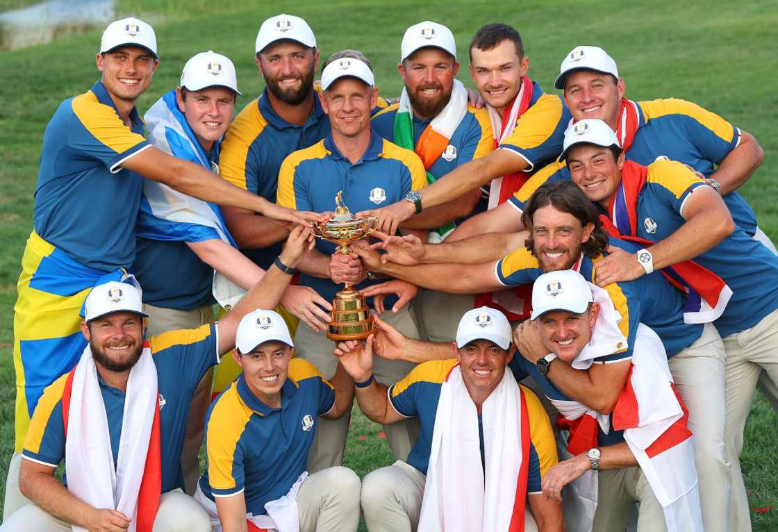 Luke Donald, Captain of Team Europe, and players of Team Europe pose following victory Luke Donald, Captain of Team Europe, and players of Team Europe pose following victory