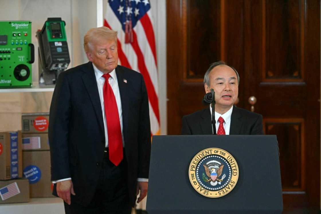 SoftBank Group has been actively investing in AI under its flamboyant founder and CEO Masayoshi Son (R) SoftBank Group has been actively investing in AI under its flamboyant founder and CEO Masayoshi Son (R)