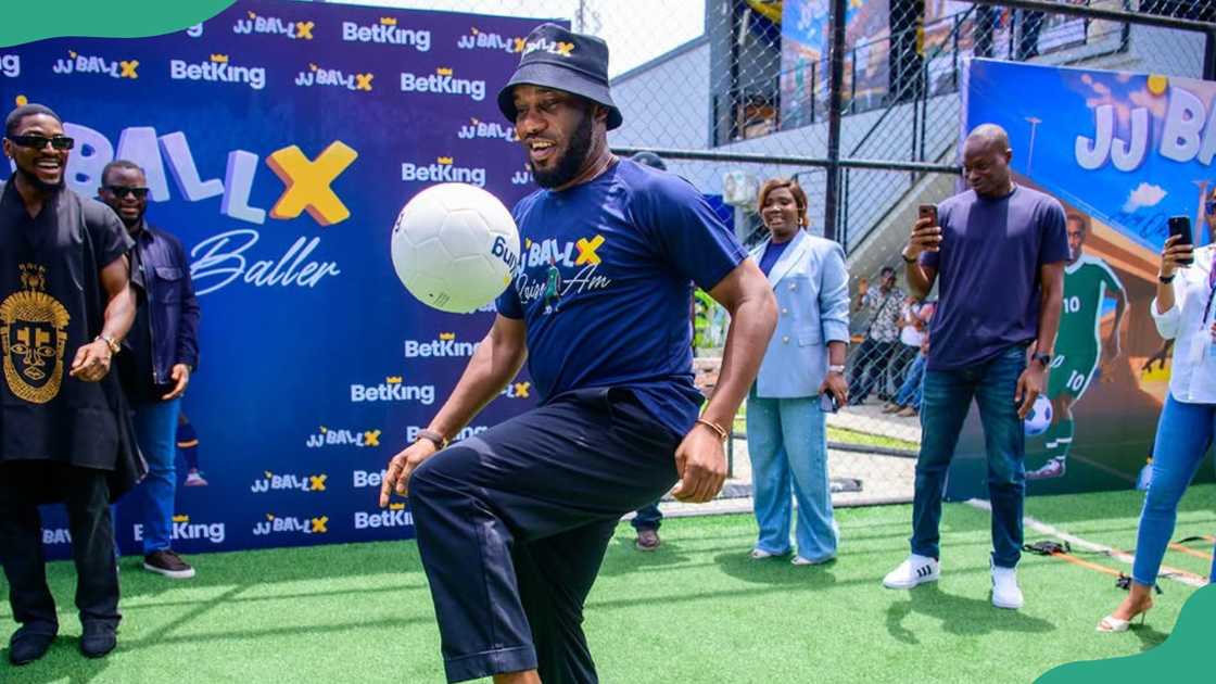 Jay Jay Okocha juggles the ball