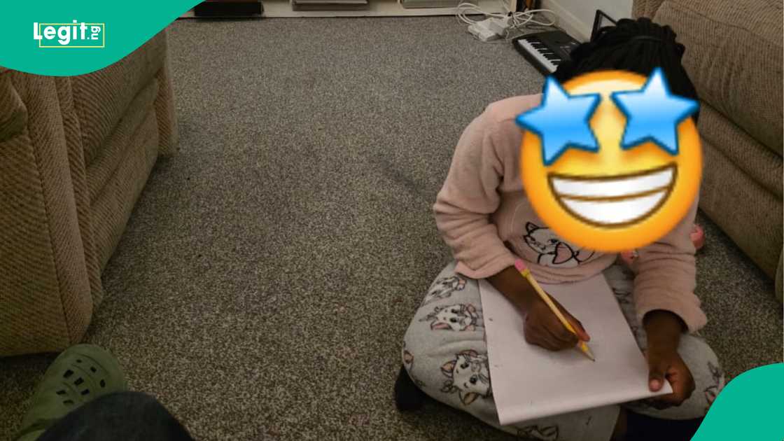 Nigerian dad cries out after seeing the drawing that his little daughter made of him.