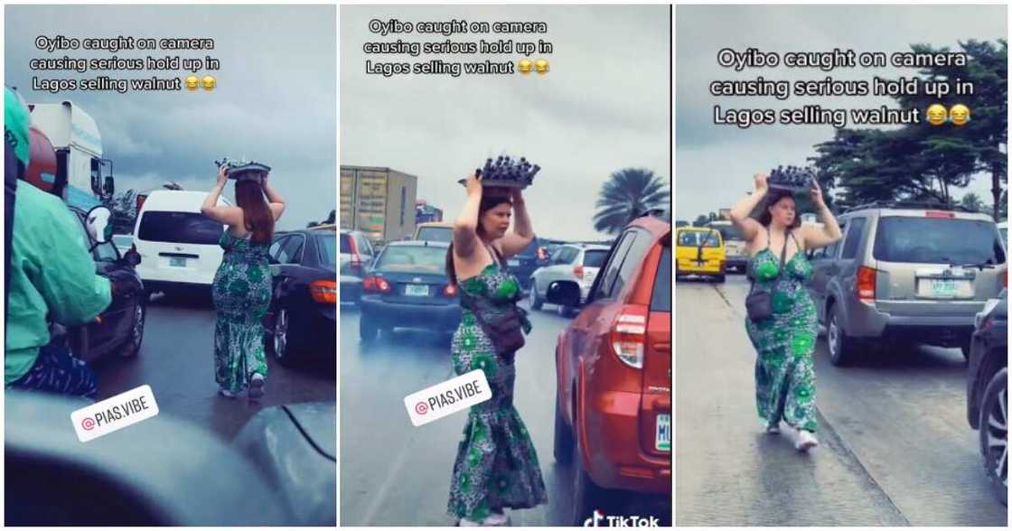 Oyinbo lady hawking in Lagos traffic, Oyinbo spotted hawking in traffic, Oyinbo lady hawking walnut in Lagos, Oyinbo hawker in Lagos Oyinbo lady hawking in Lagos traffic, Oyinbo spotted hawking in traffic, Oyinbo lady hawking walnut in Lagos, Oyinbo hawker in Lagos