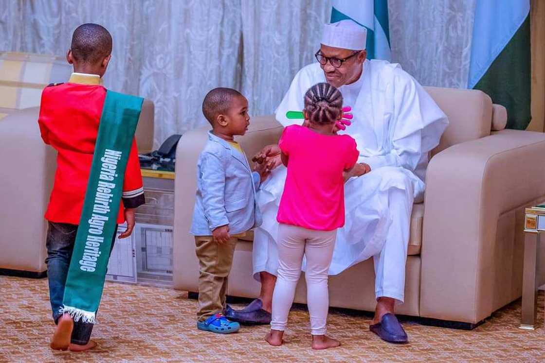 Children’s Day: Presidency shares cute photos of Buhari playing with kids