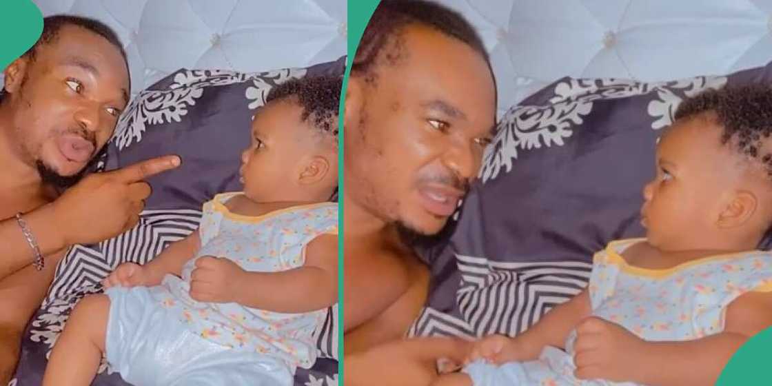 Nigerian man, baby Nigerian man, baby