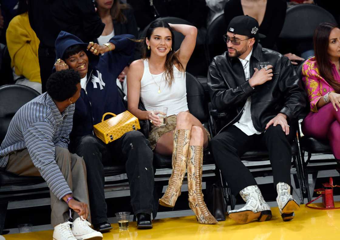Yung Taco, Renell Medrano, Kendall Jenner and Bad Bunny attend the Western Conference Semifinal Playoff gam Yung Taco, Renell Medrano, Kendall Jenner and Bad Bunny attend the Western Conference Semifinal Playoff gam