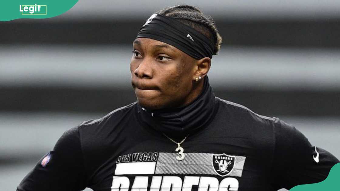 Henry Ruggs looks on during a training session
