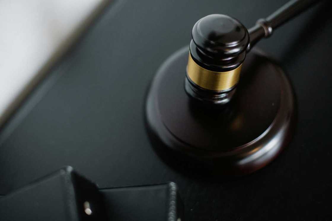 A close-up photo of a wooden gavel used by judges in court