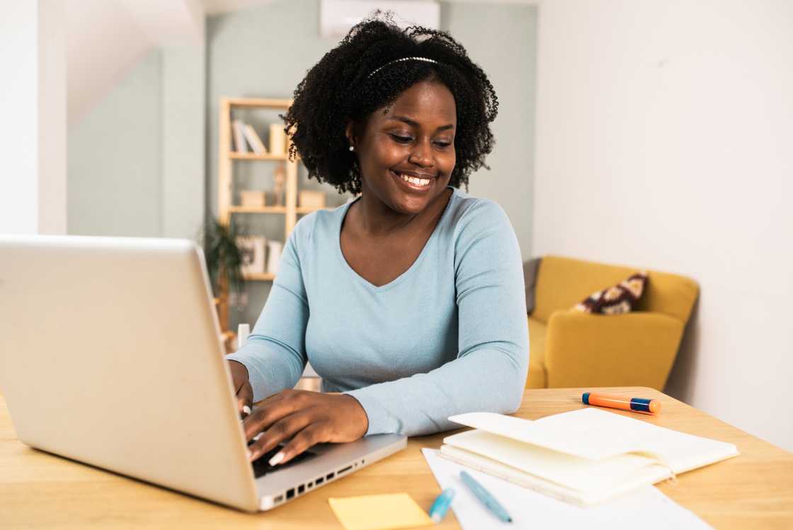 A happy lady working from home A happy lady working from home