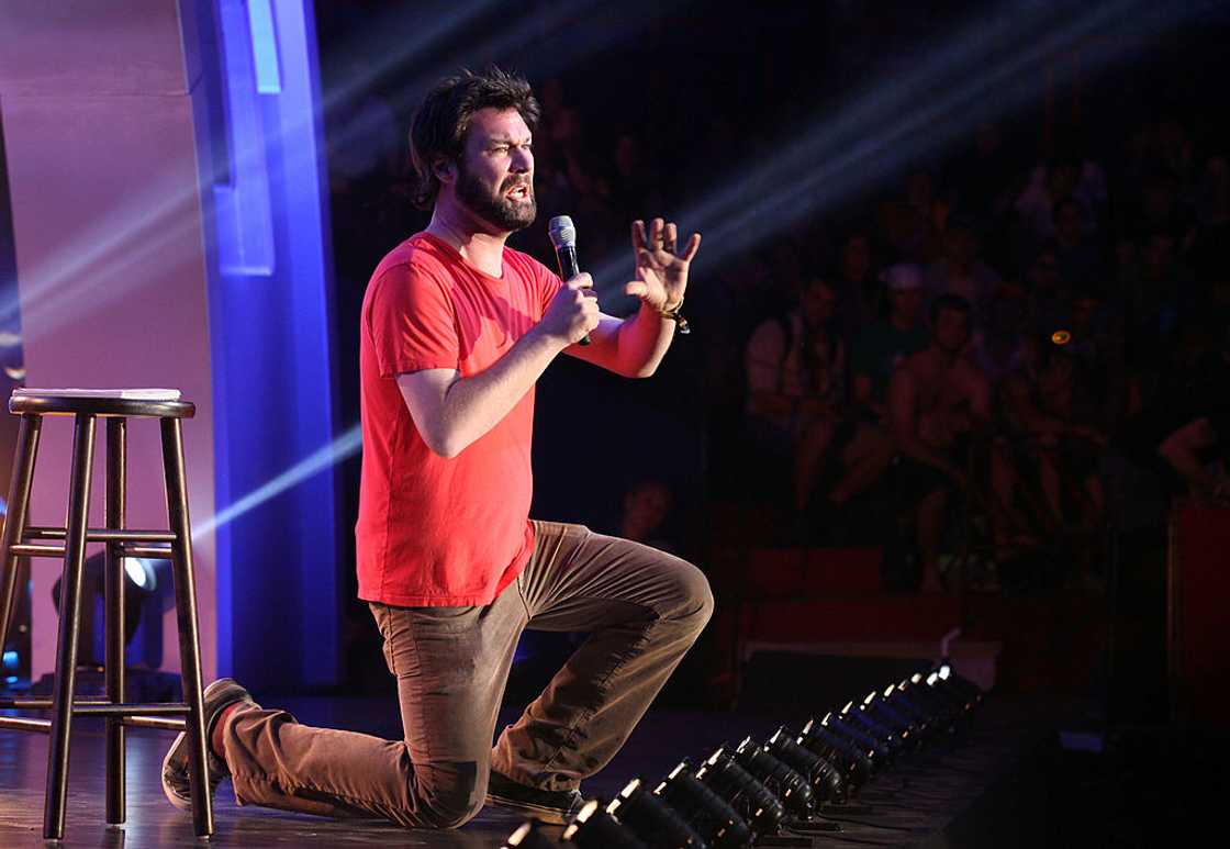 Jon Dore performs during a stand-up show