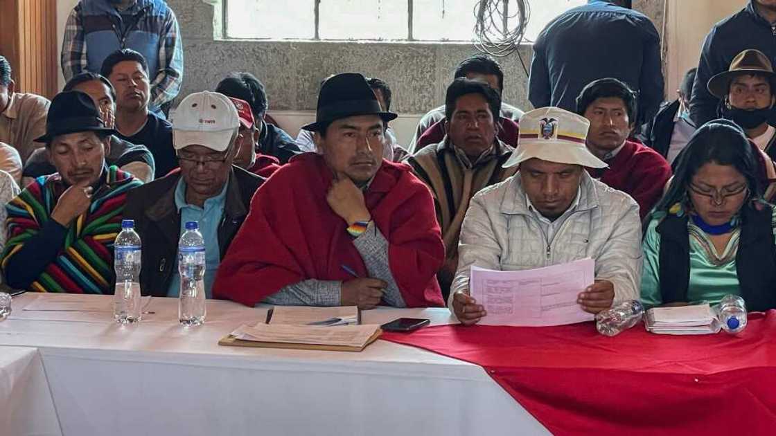 Indigenous leader Leonidas Iza (C) met with members of Ecuador's Parliament and Catholic Church for negotiations to end the latest standoff over the rising cost of living, but the government left the negotiations after a soldier was killed Indigenous leader Leonidas Iza (C) met with members of Ecuador's Parliament and Catholic Church for negotiations to end the latest standoff over the rising cost of living, but the government left the negotiations after a soldier was killed
