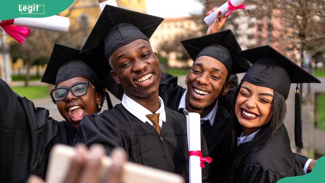 Young graduates celebrating.
