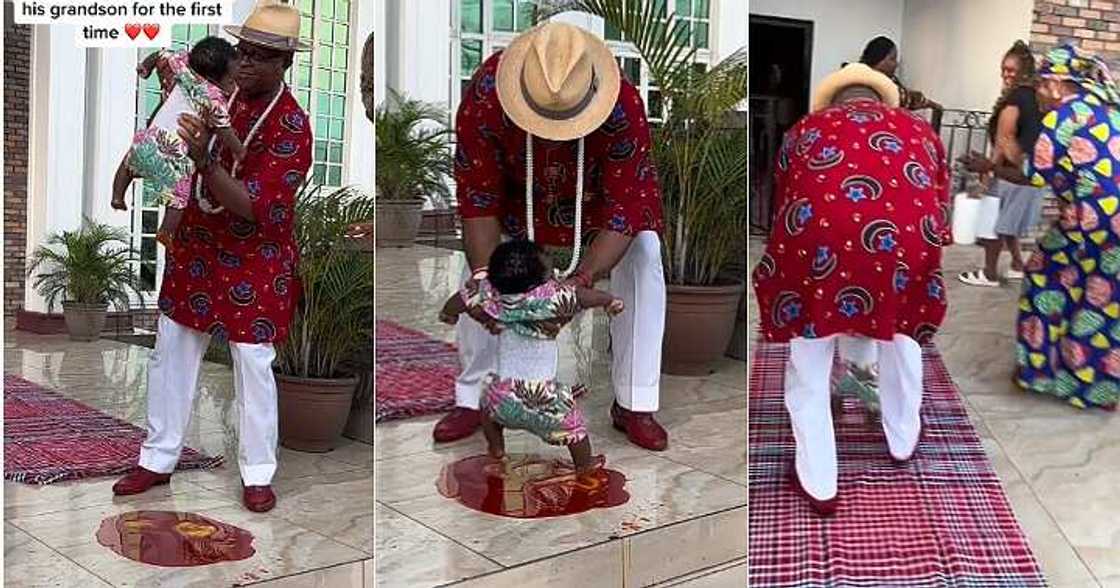 Man dips grandson's feet in palm oil, tradition