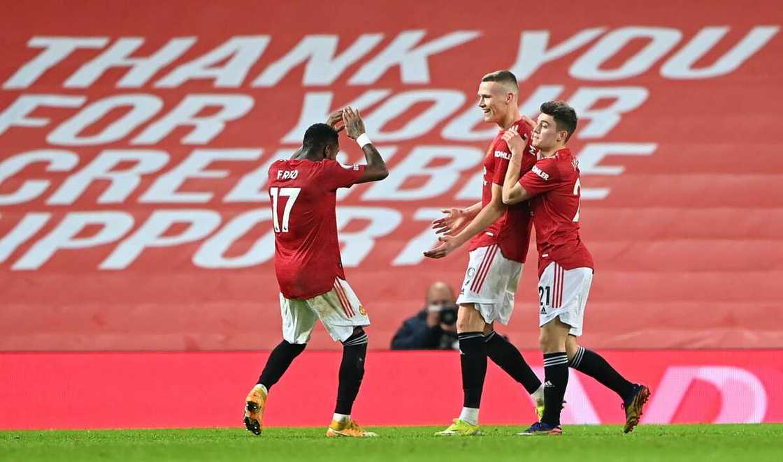 Manchester United players in action at Old Trafford.