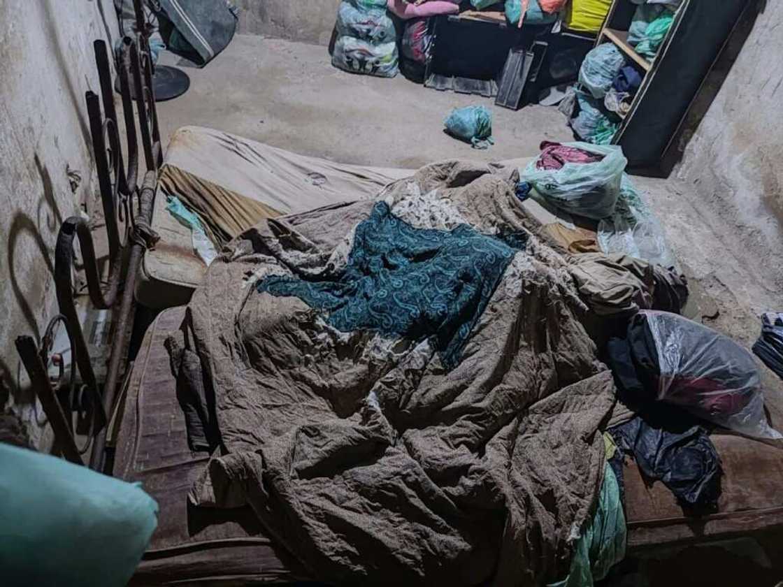 This handout picture released by Rio de Janeiro's military police shows a room where a woman and her two children were imprisoned for 17 years by her husband in Rio's Guaratiba neighborhood This handout picture released by Rio de Janeiro's military police shows a room where a woman and her two children were imprisoned for 17 years by her husband in Rio's Guaratiba neighborhood