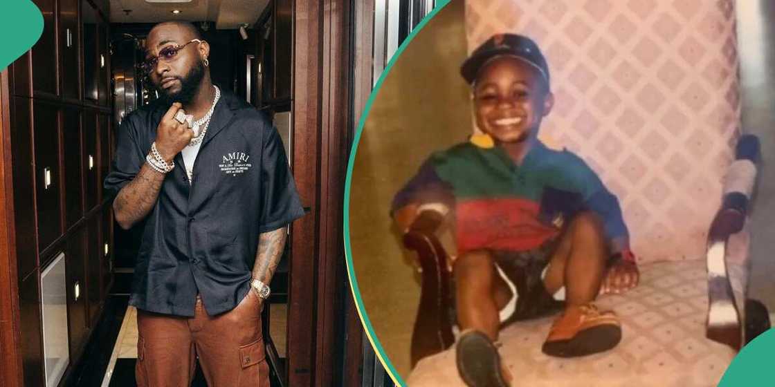 Davido with huge smile in baby photo.