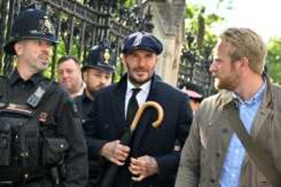 Former England footballer David Beckham joined the public in huge queues waiting to see the queen lying in state Former England footballer David Beckham joined the public in huge queues waiting to see the queen lying in state