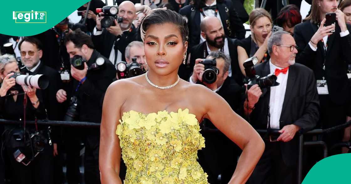 Taraji p Henson gives Tyler Perry his flowers during an interview. Taraji p Henson gives Tyler Perry his flowers during an interview.