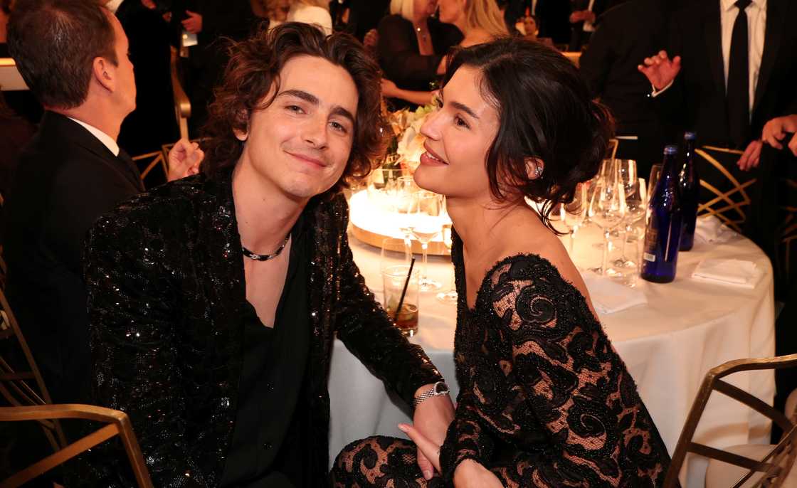 Timothée Chalamet and Kylie Jenner sit together at the Golden Globe Awards