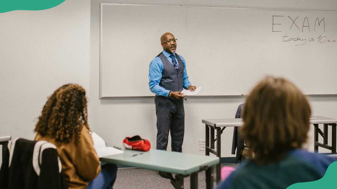 A lecturer teaching students A lecturer teaching students